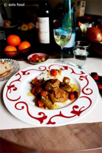Lemony veal stew with mustard, peppers, carrots and oregano