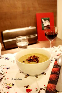 Soup with two celery, apple and hazelnuts